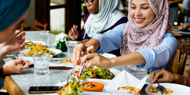 Muslim women hijab having dinner